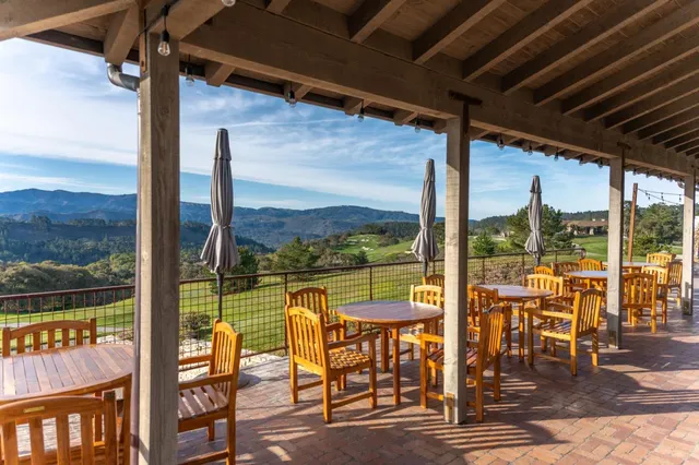 an outdoor view of the patio and dining space