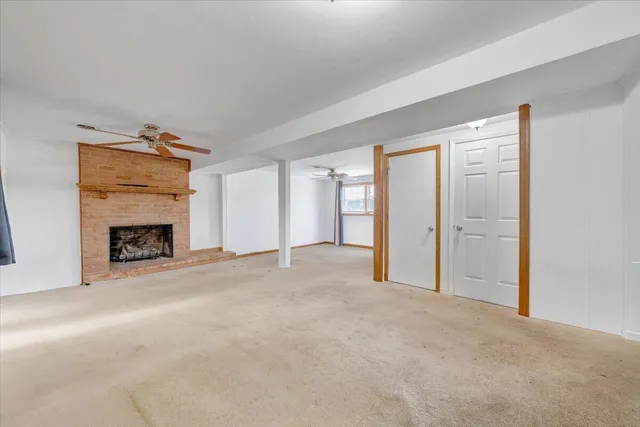 a bedroom with a bed and couch