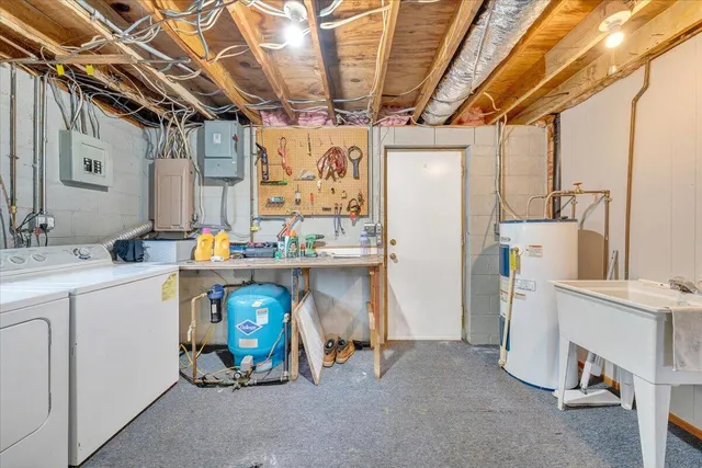 an outdoor view of house with yard and entertaining space