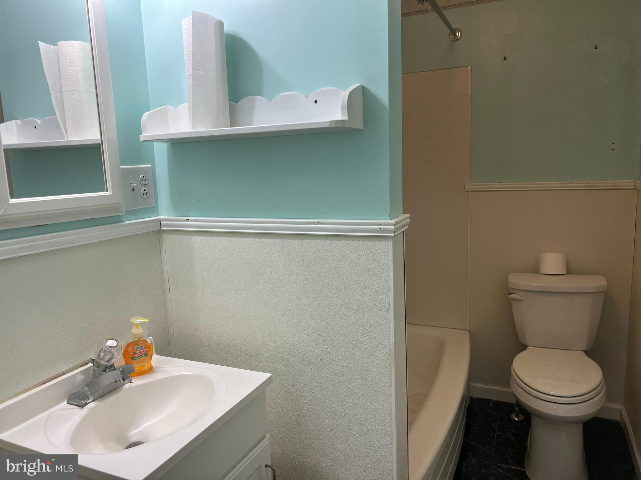25447 Cascade Road Cascade, MD 21719 - Photo 14 of 22 a bathroom with a sink and a toilet