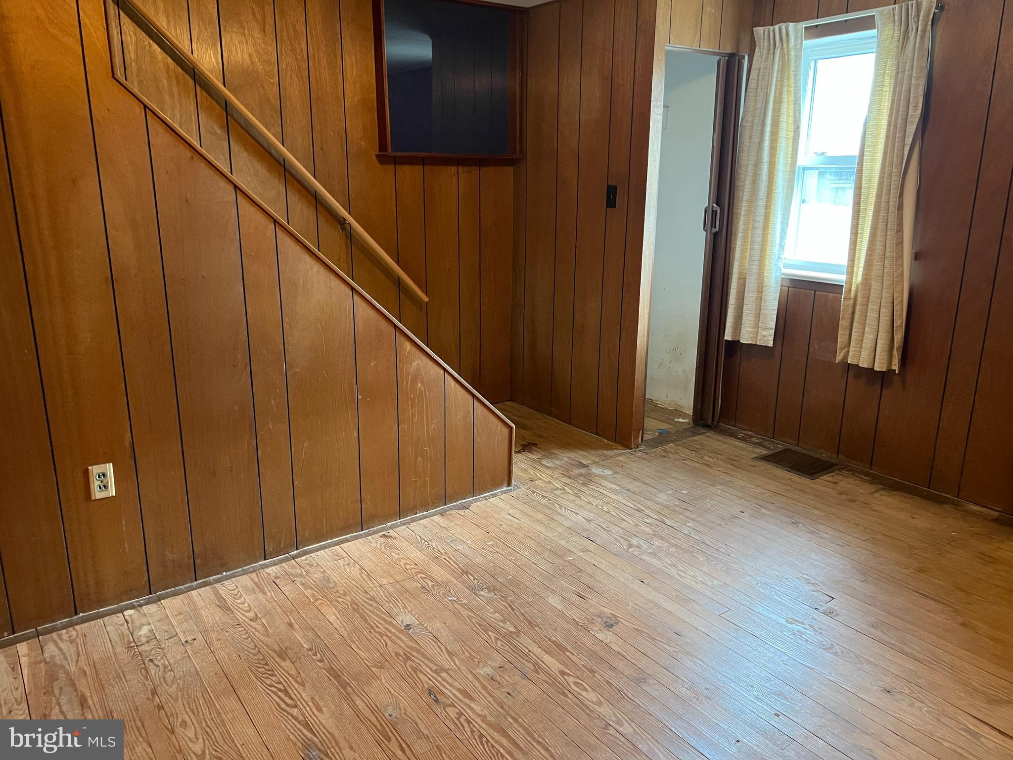 25447 Cascade Road Cascade, MD 21719 - Photo 16 of 22 a view of an empty room with wooden floor
