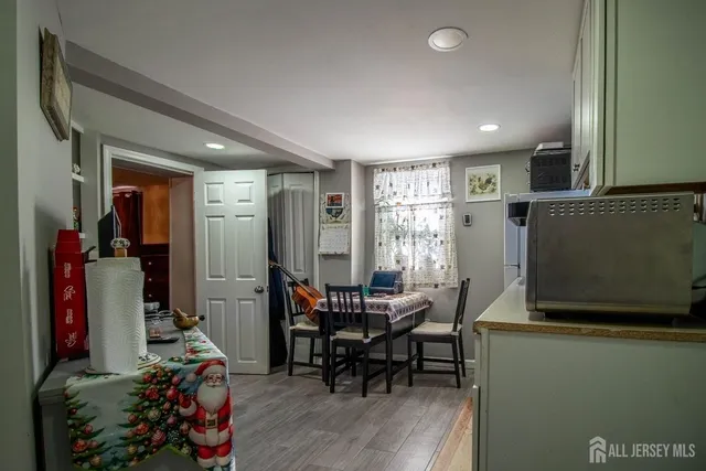 a view of a livingroom with furniture and a flat screen tv