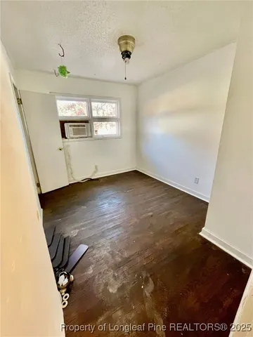 a view of livingroom with furniture and windows