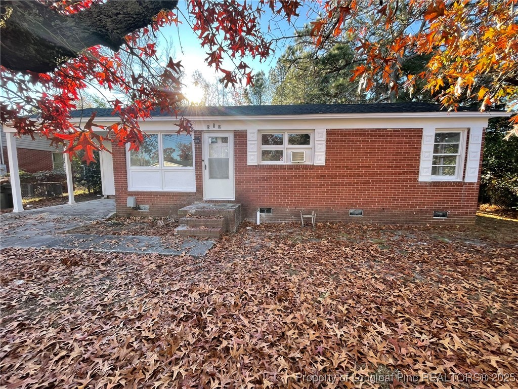 502 Spring Avenue Spring Lake, NC 28390 - Photo 2 of 20 a backyard of a house with lots of green space