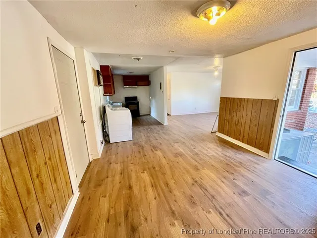 a view of kitchen and utility room