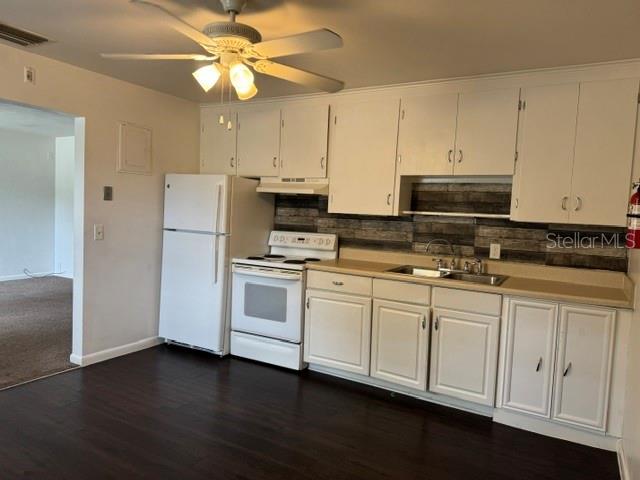 2075 Howell Branch Road, Unit 101 Maitland, FL 32751 - Photo 6 of 9 a kitchen with granite countertop white cabinets and white appliances