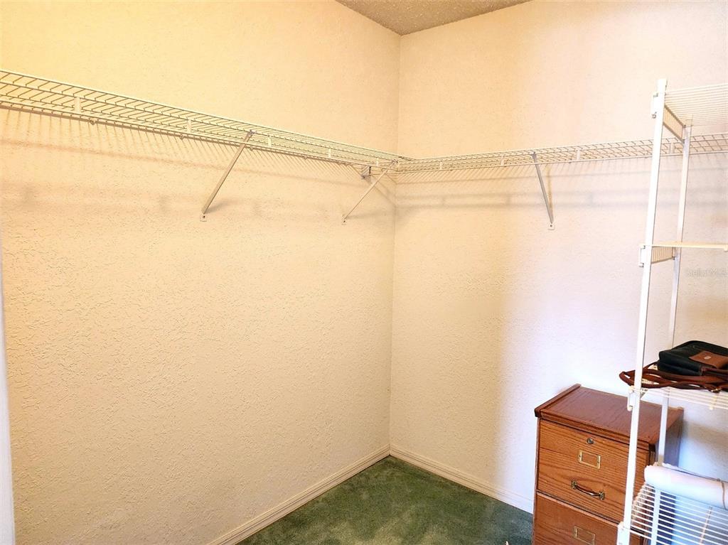 11660 Southwest 89th Terrace Ocala, FL 34481 - Photo 11 of 16 a view of a room with racks on the wall