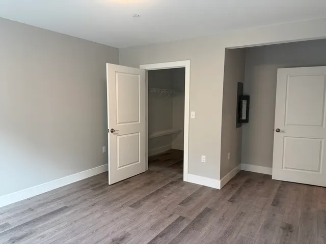 a view of a room with racks on the wall