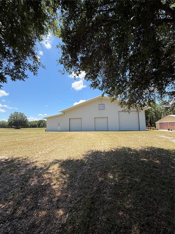 7390 South Mc Alpin Road McAlpin, FL 32062 - Photo 46 of 53 a view of an outdoor space and a yard