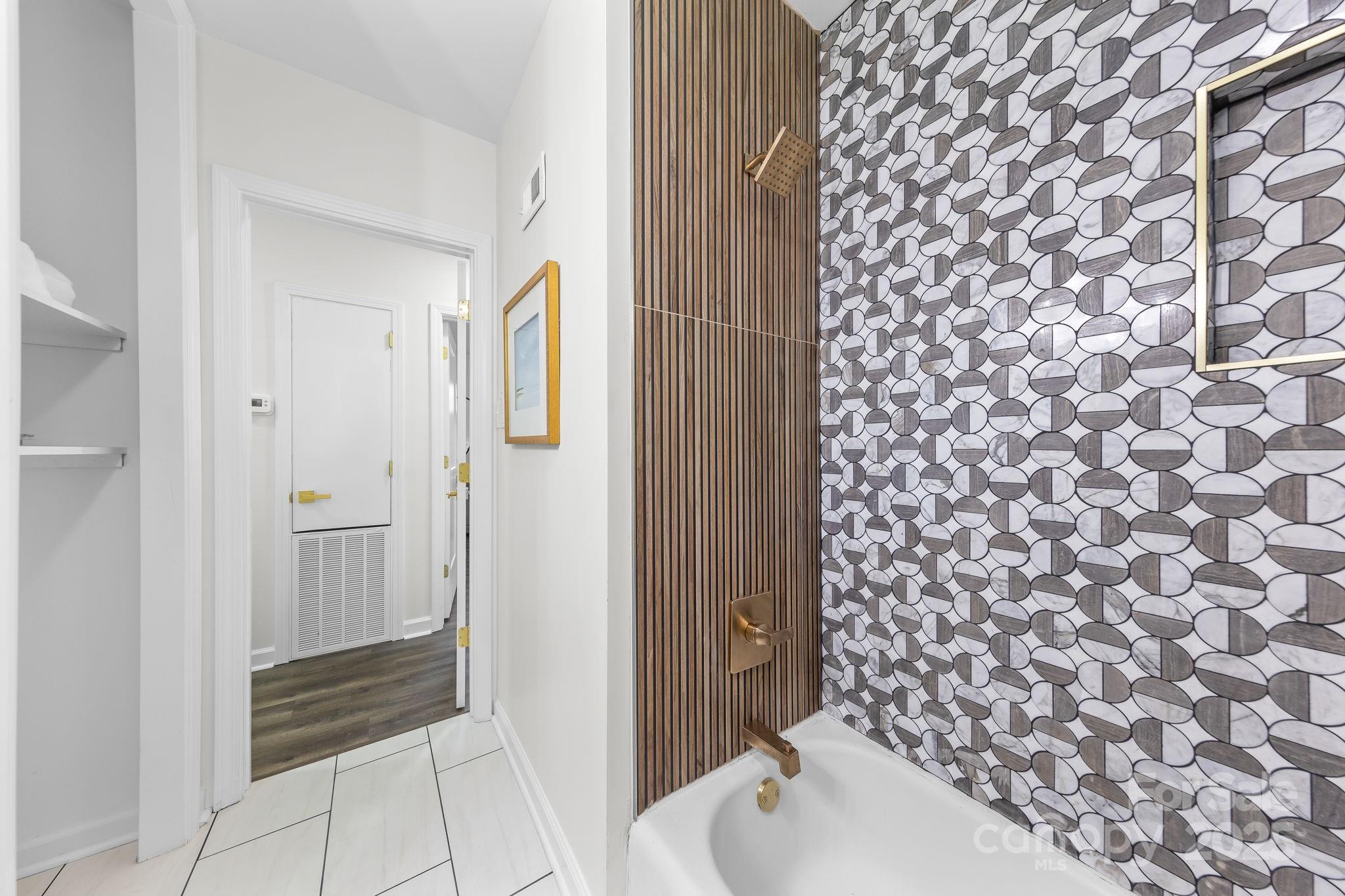 4226 Randolph Road Charlotte, NC 28211 - Photo 17 of 23 a bathroom with a sink and a bathtub