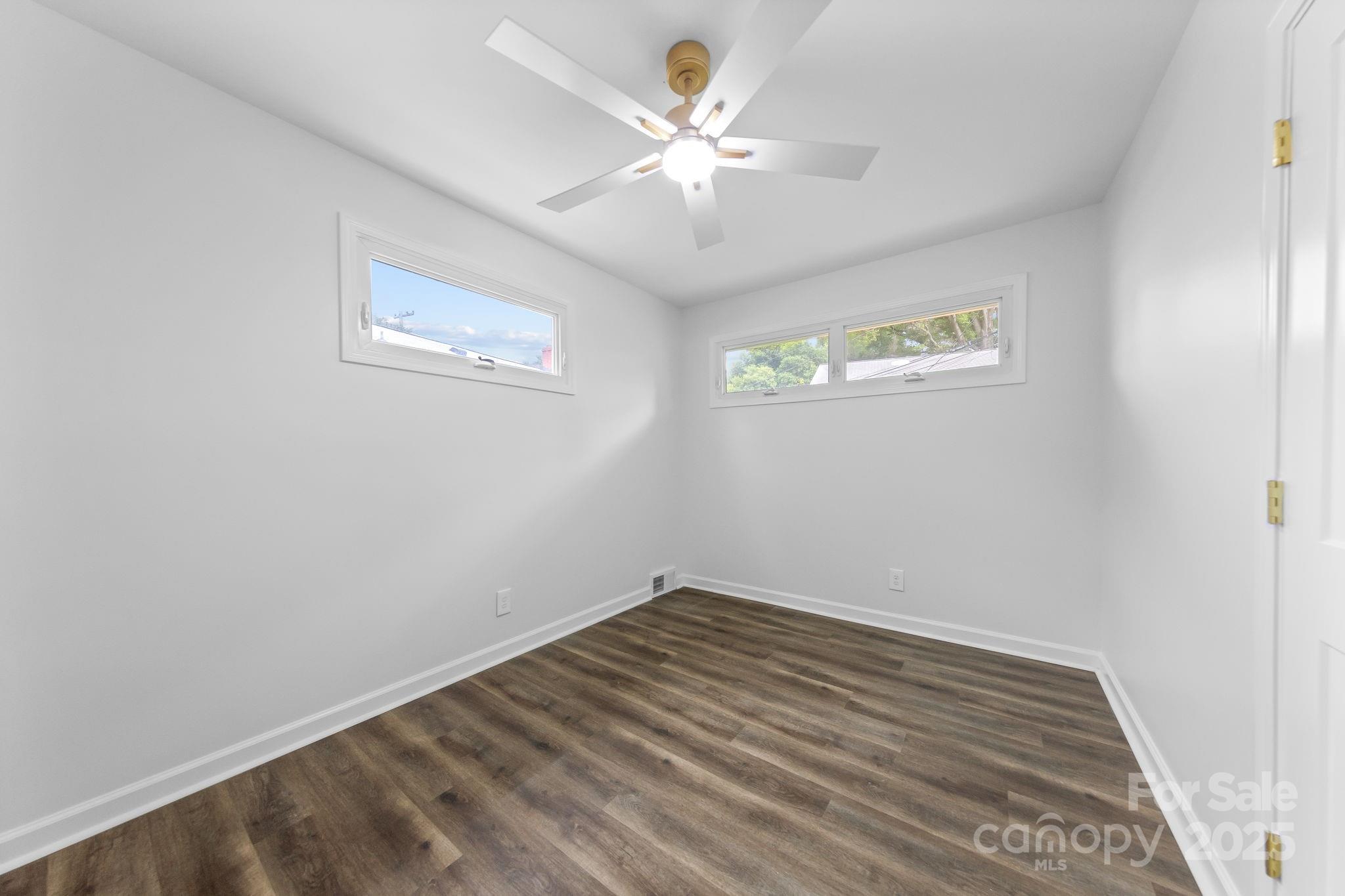 4226 Randolph Road Charlotte, NC 28211 - Photo 18 of 23 a view of an empty room with a window