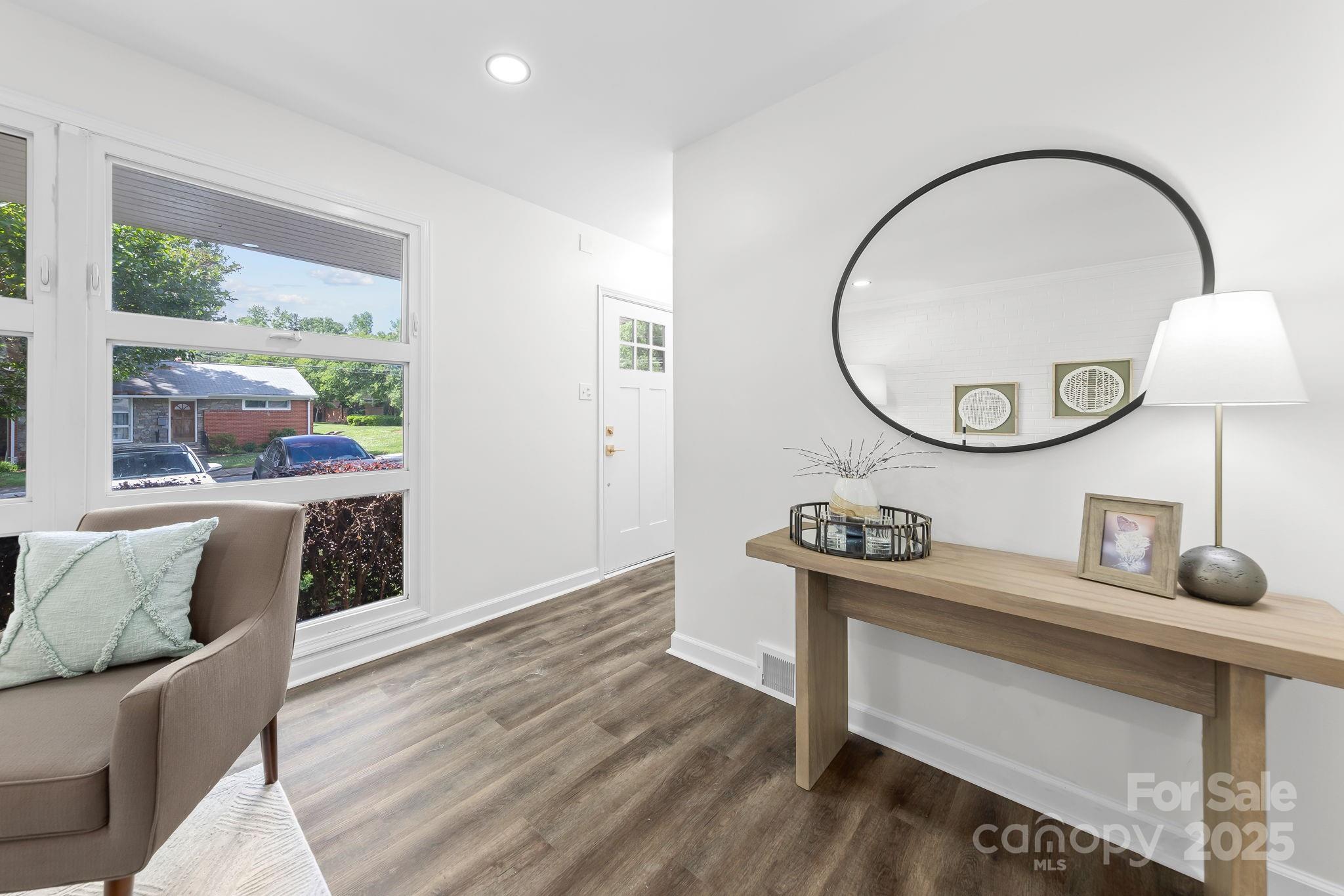 4226 Randolph Road Charlotte, NC 28211 - Photo 6 of 23 a living room with furniture and wooden floor