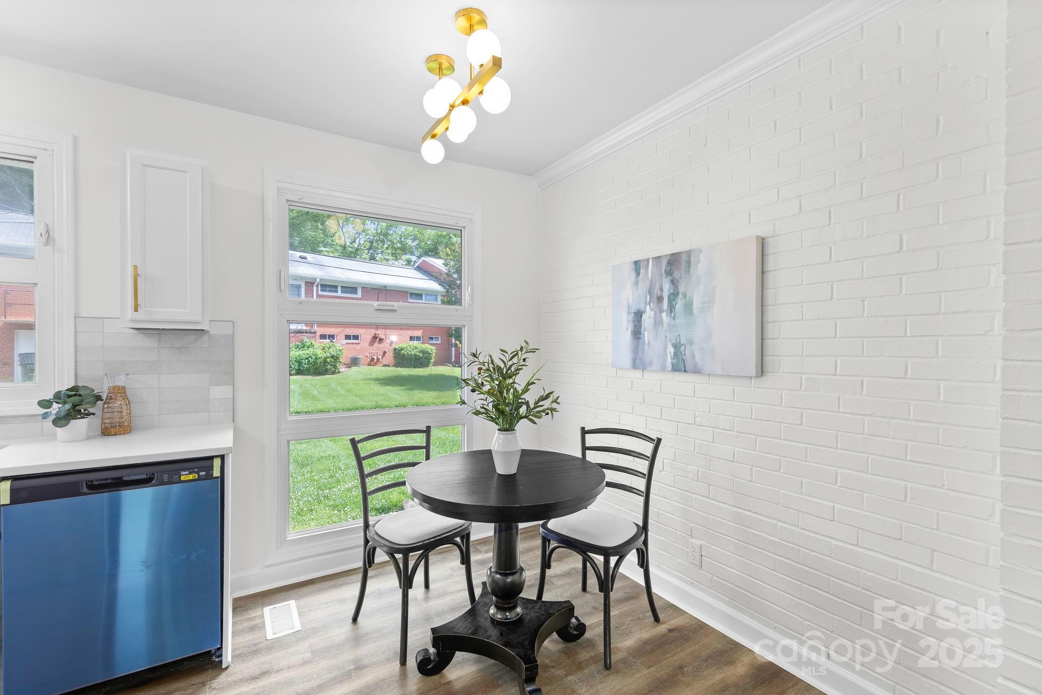 4226 Randolph Road Charlotte, NC 28211 - Photo 8 of 23 a view of a dining room with furniture window and outside view