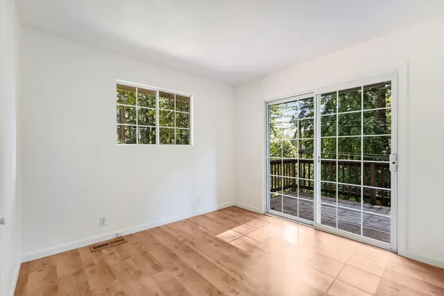 an empty room with windows