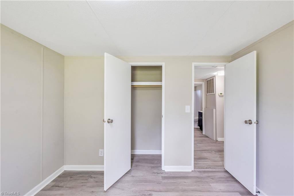 628 Maple Grove Church Road Hays, NC 28635 - Photo 26 of 28 Spare Bedroom with Closet