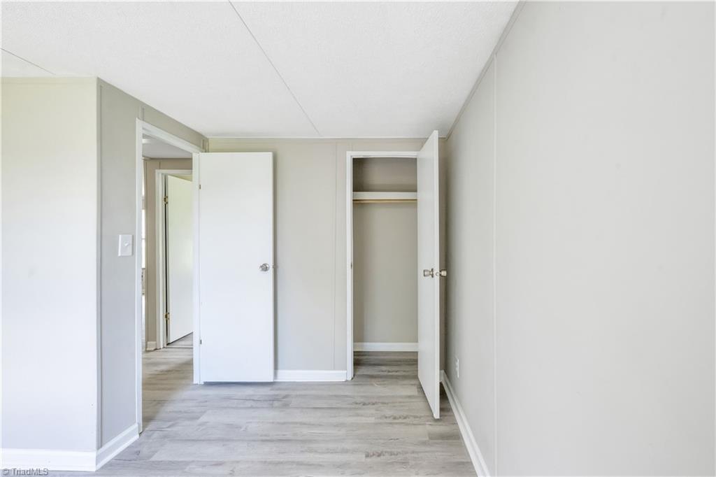 628 Maple Grove Church Road Hays, NC 28635 - Photo 28 of 28 Spare Bedroom with Closet