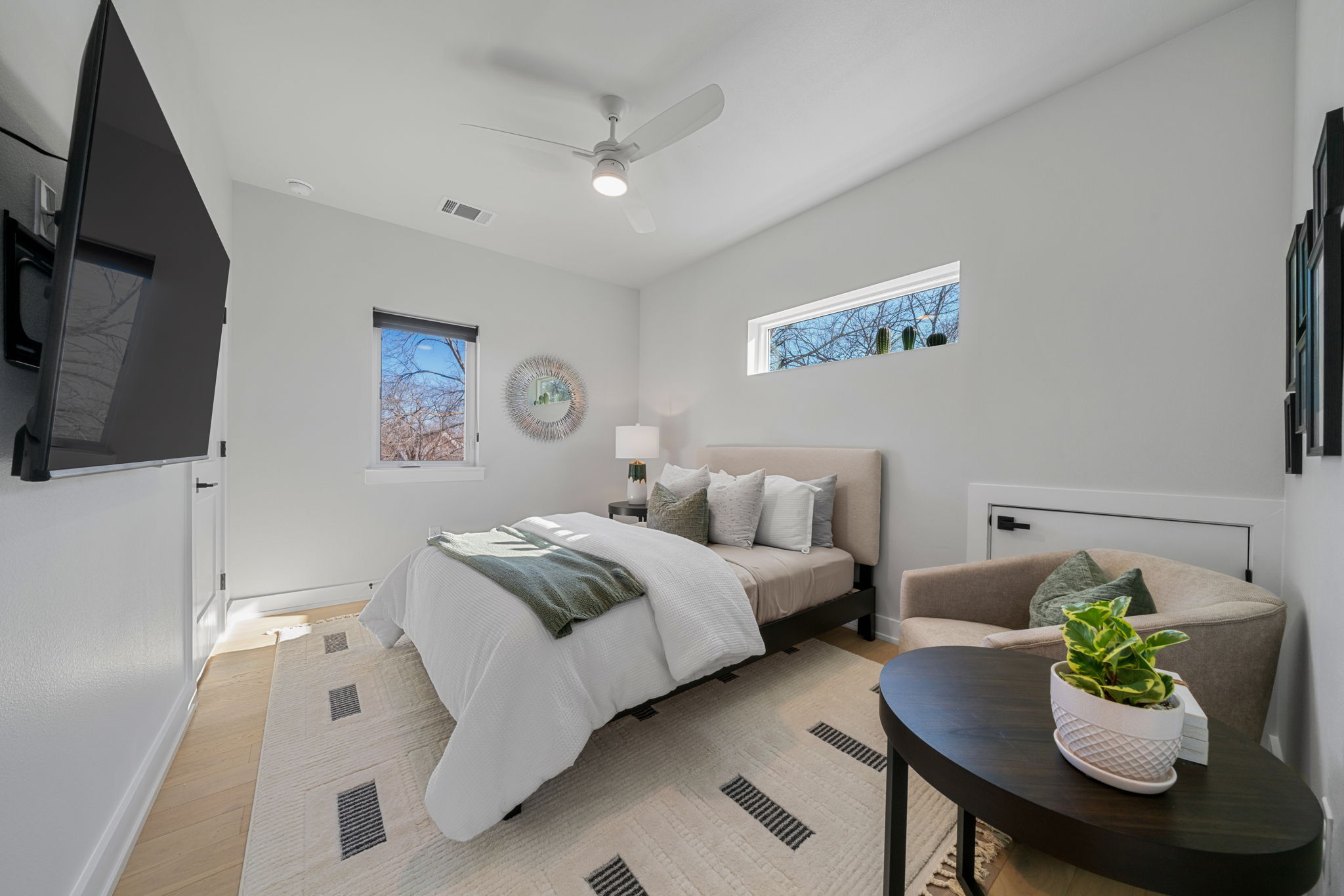 4607 Leslie Avenue, Unit A Austin, TX 78721 - Photo 13 of 20 Two additional bedrooms on the second floor offer flexibility for guests or roommates