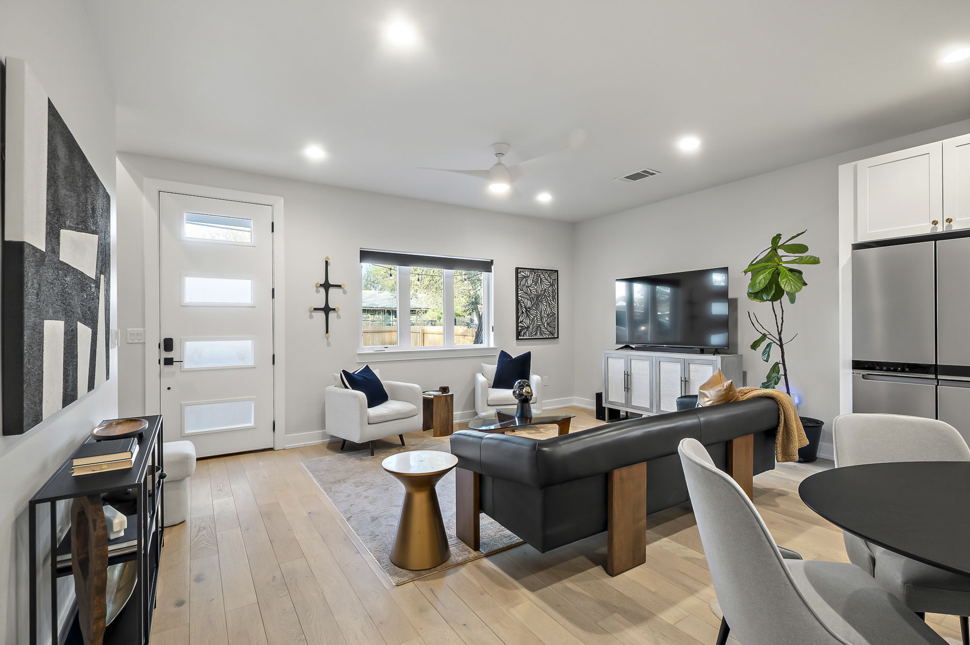 4607 Leslie Avenue, Unit A Austin, TX 78721 - Photo 4 of 20 The open-concept main living areas flow together seamlessly and offer plenty of space for entertaining