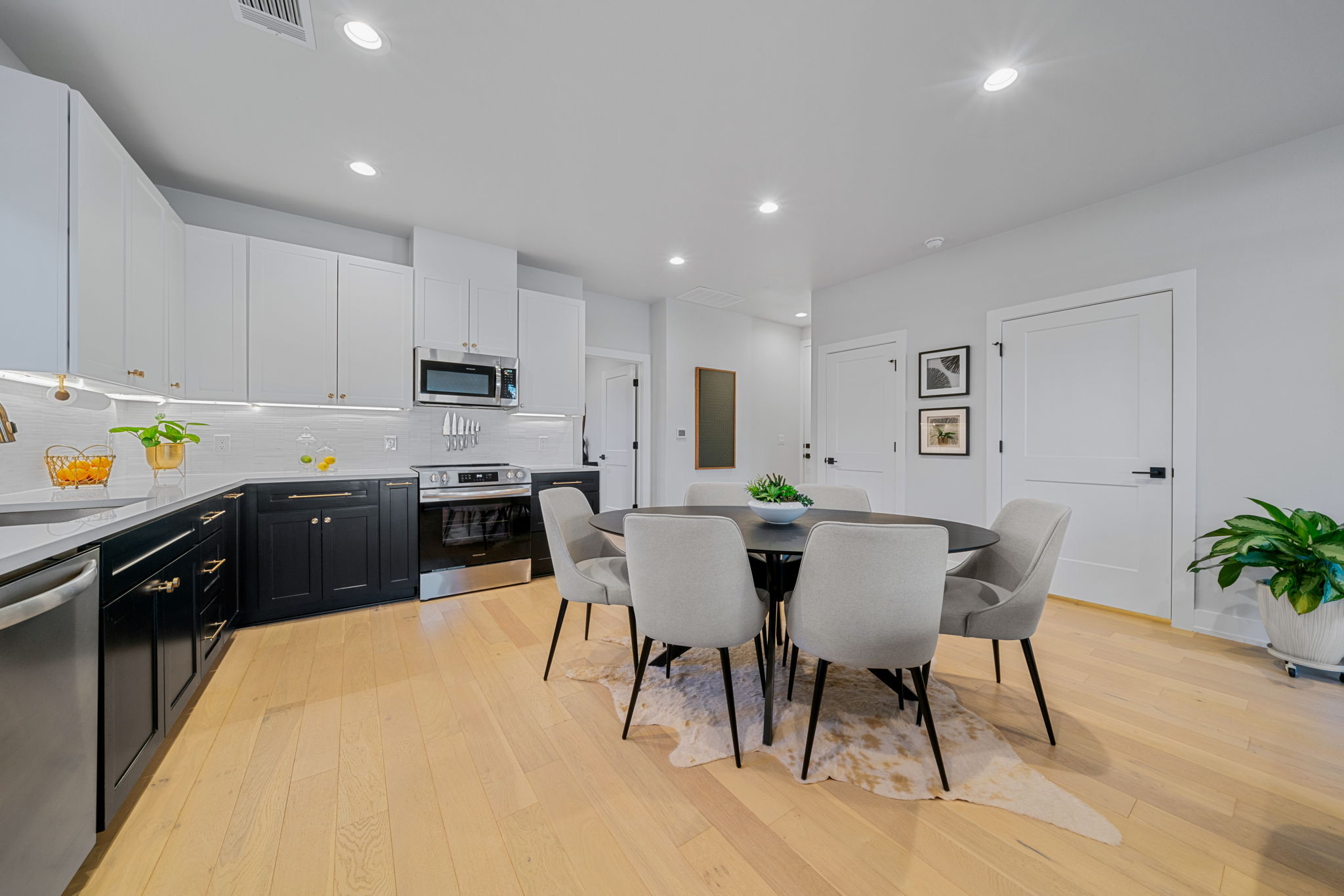 4607 Leslie Avenue, Unit A Austin, TX 78721 - Photo 5 of 20 The gourmet kitchen includes sleek finishes, including stainless steel appliances, neutral cabinetry, and quartz countertops