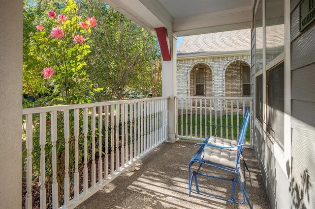 a view of a wooden house with a porch