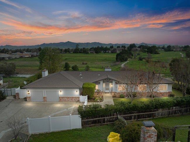 65 Rays Circle Hollister, CA 95023 - Photo 1 of 1 an aerial view of a house with a lake view