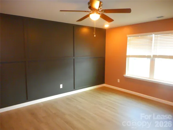 a bathroom with a double vanity sink and mirror