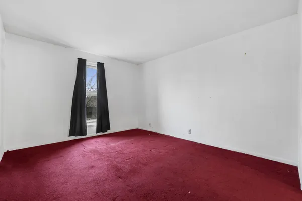 an empty room with a natural light
