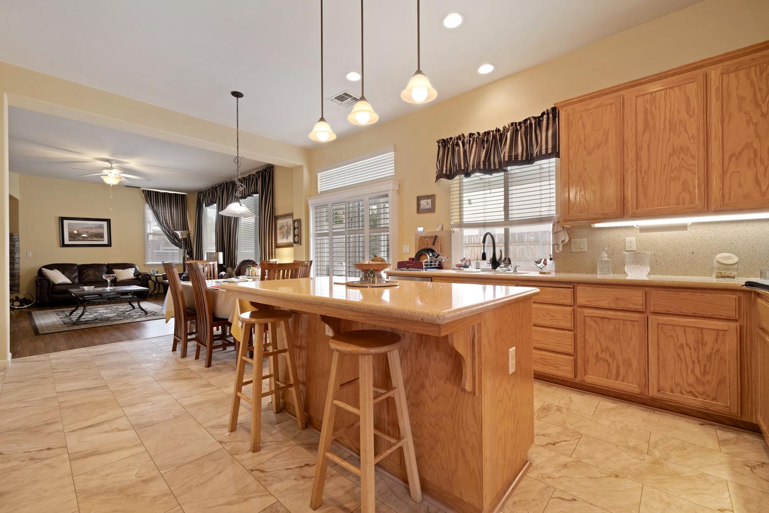 4237 Blake Drive Modesto, CA 95356 - Photo 18 of 49 a large kitchen with lots of counter space and a sink