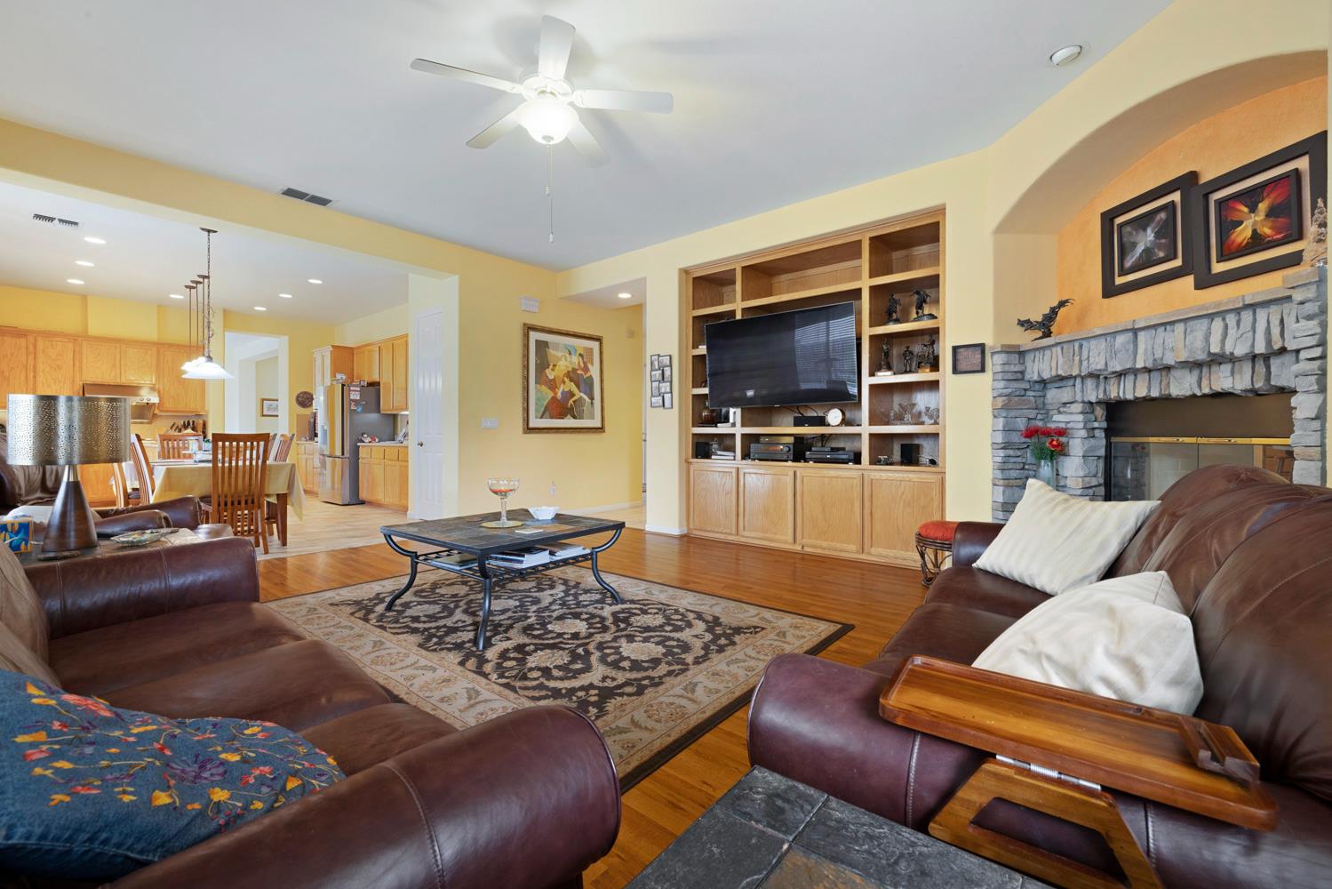 4237 Blake Drive Modesto, CA 95356 - Photo 26 of 49 a living room with furniture and a fireplace