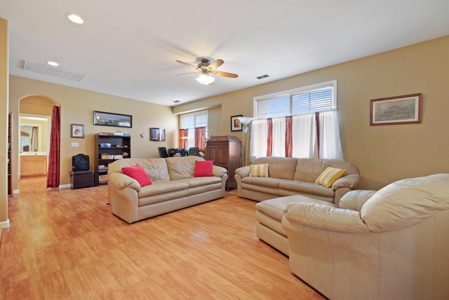 4237 Blake Drive Modesto, CA 95356 - Photo 30 of 49 a living room with furniture and a flat screen tv