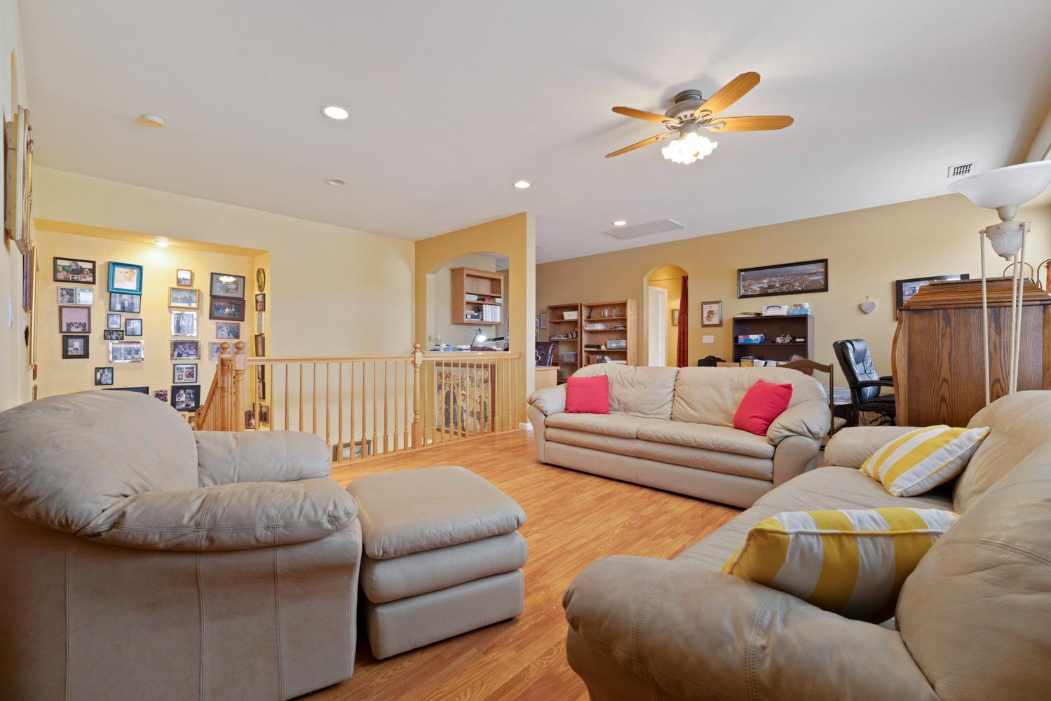 4237 Blake Drive Modesto, CA 95356 - Photo 31 of 49 a living room with furniture and kitchen view
