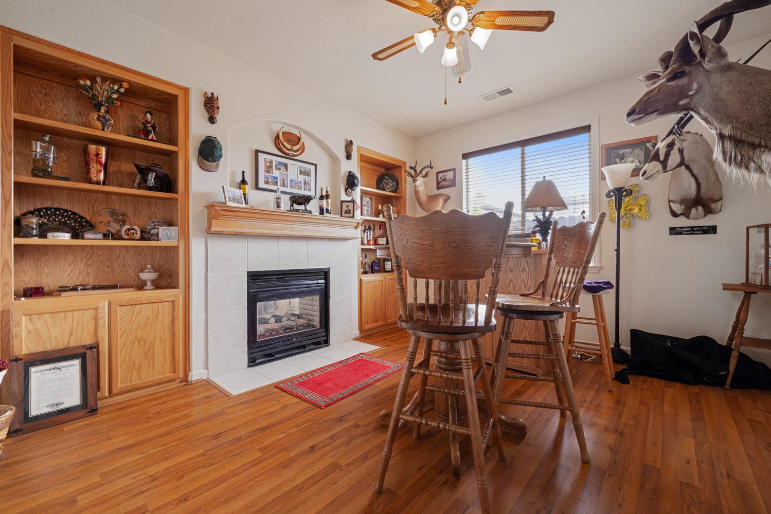 4237 Blake Drive Modesto, CA 95356 - Photo 10 of 49 a view of a livingroom with furniture and chandelier fan
