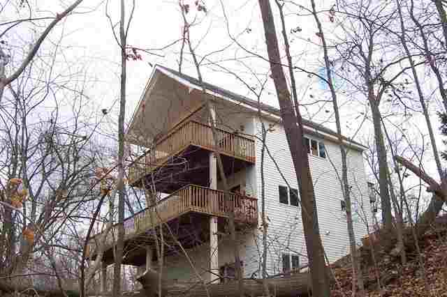 9293 West Diggin Hill Road Hanover, IL 61041 - Photo 2 of 19 a house that has tree in front of it
