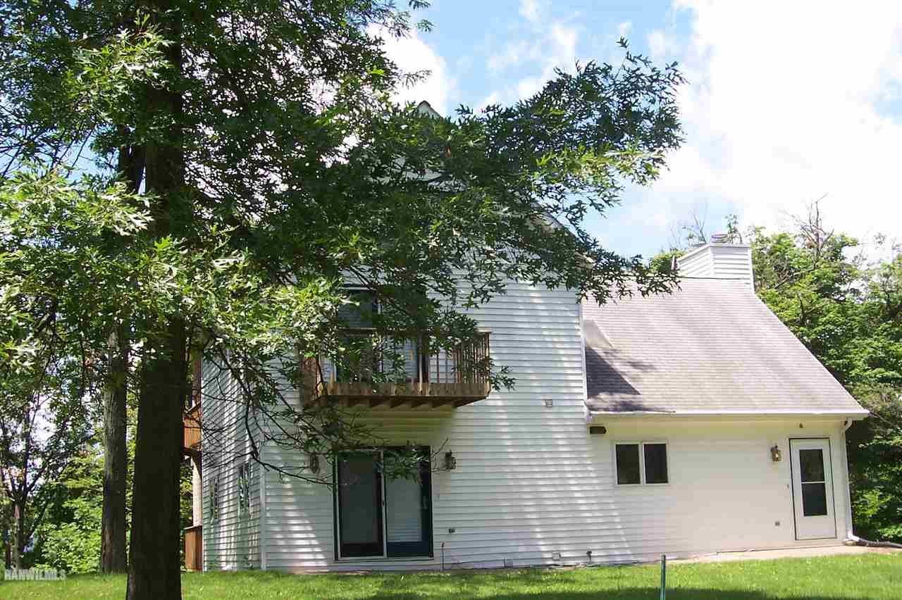 9293 West Diggin Hill Road Hanover, IL 61041 - Photo 7 of 19 a view of a house with a yard