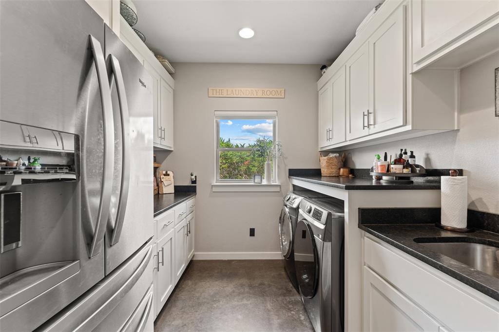 124 Bluffview Circle China Spring, TX 76633 - Photo 15 of 40 Spacious utility room with room for butlers pantry on the left