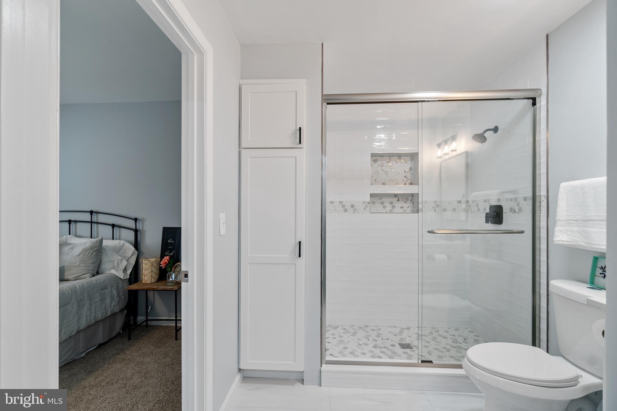 3335 Thomas Point Road Annapolis, MD 21403 - Photo 17 of 37 Custom Storage, Tile and Glass Shower Door