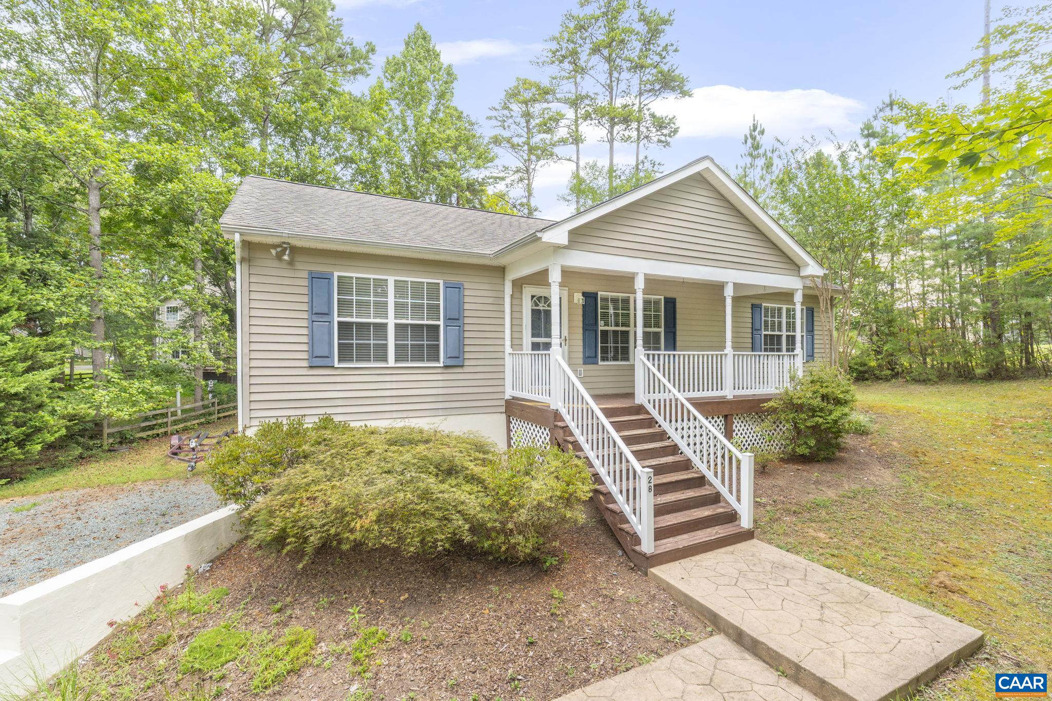 28 Lafayette Drive Palmyra, VA 22963 - Photo 1 of 35 a front view of a house with a yard