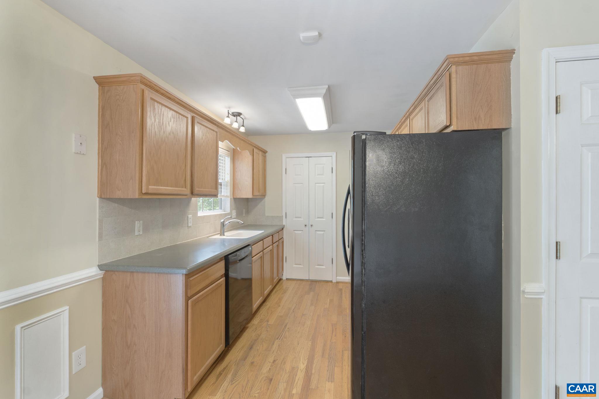 28 Lafayette Drive Palmyra, VA 22963 - Photo 11 of 35 a kitchen with stainless steel appliances granite countertop a refrigerator and a stove top oven
