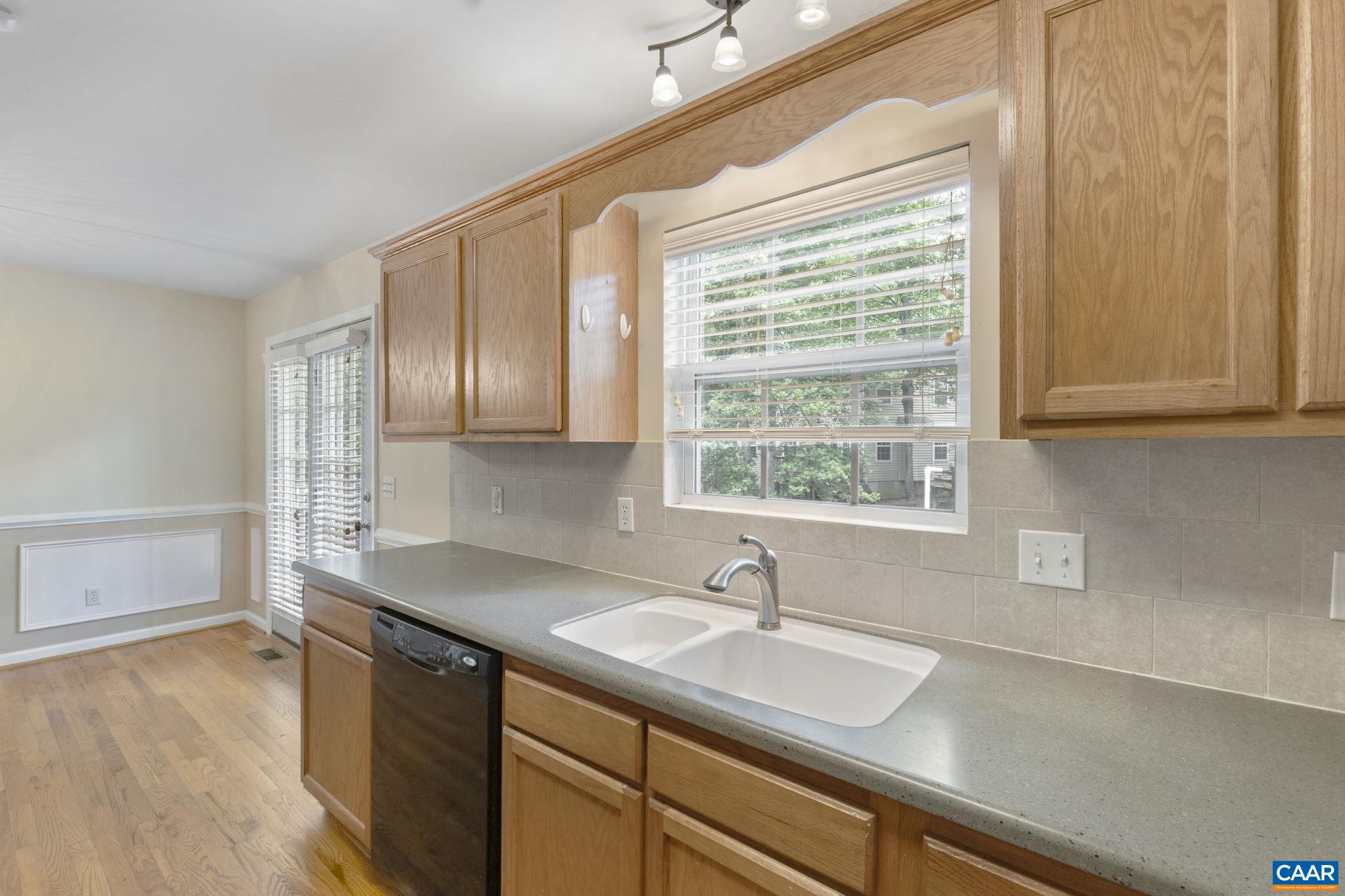 28 Lafayette Drive Palmyra, VA 22963 - Photo 13 of 35 a kitchen with a sink cabinets and window