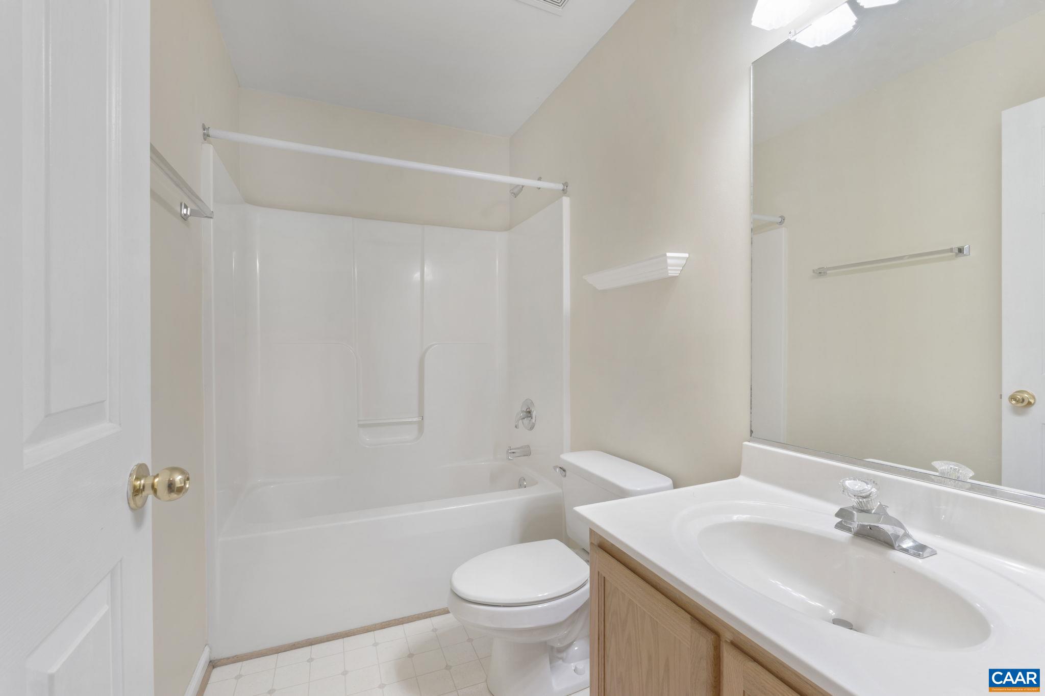 28 Lafayette Drive Palmyra, VA 22963 - Photo 16 of 35 a bathroom with a sink a toilet and shower