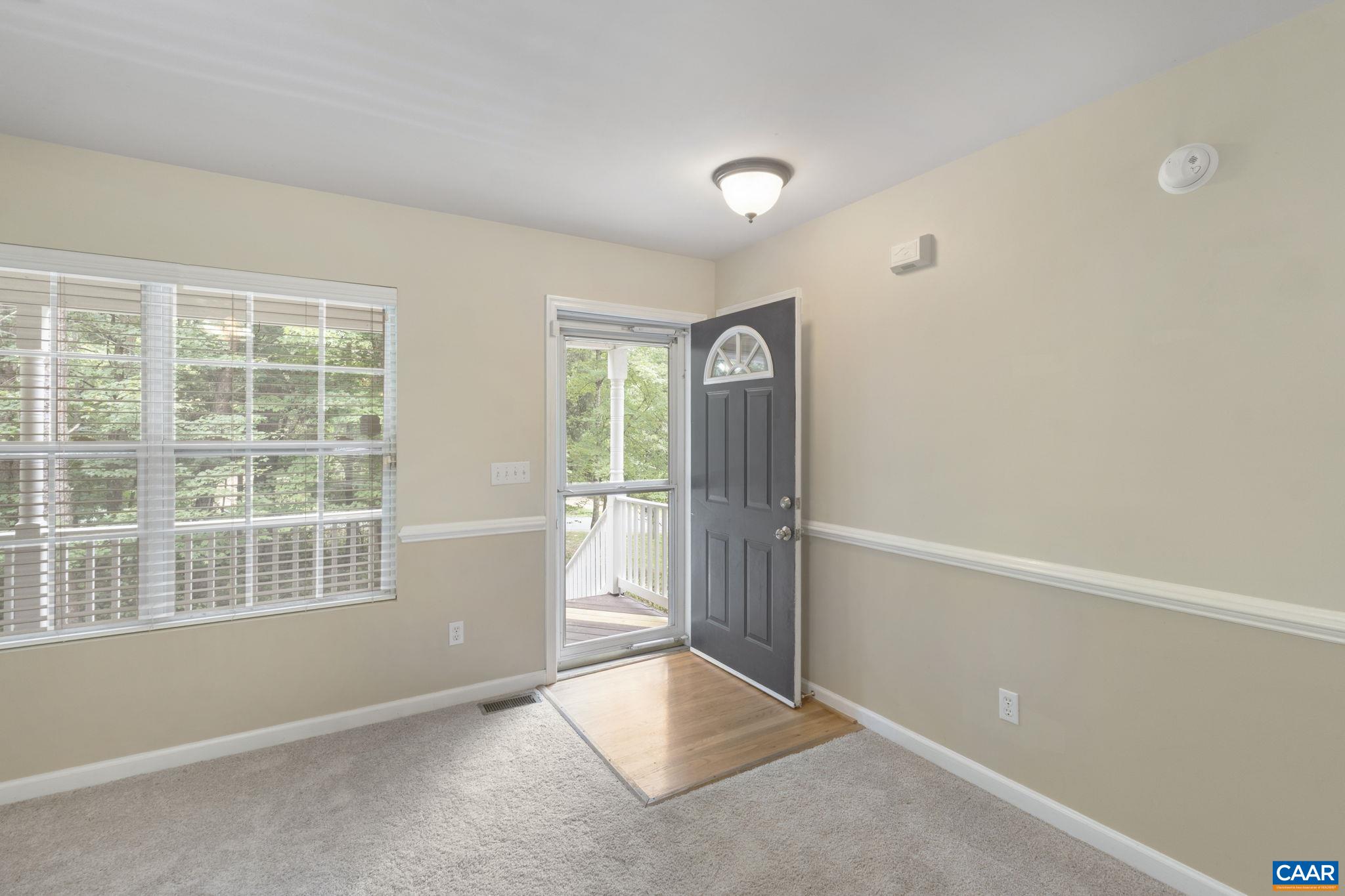 28 Lafayette Drive Palmyra, VA 22963 - Photo 2 of 35 an empty room with windows