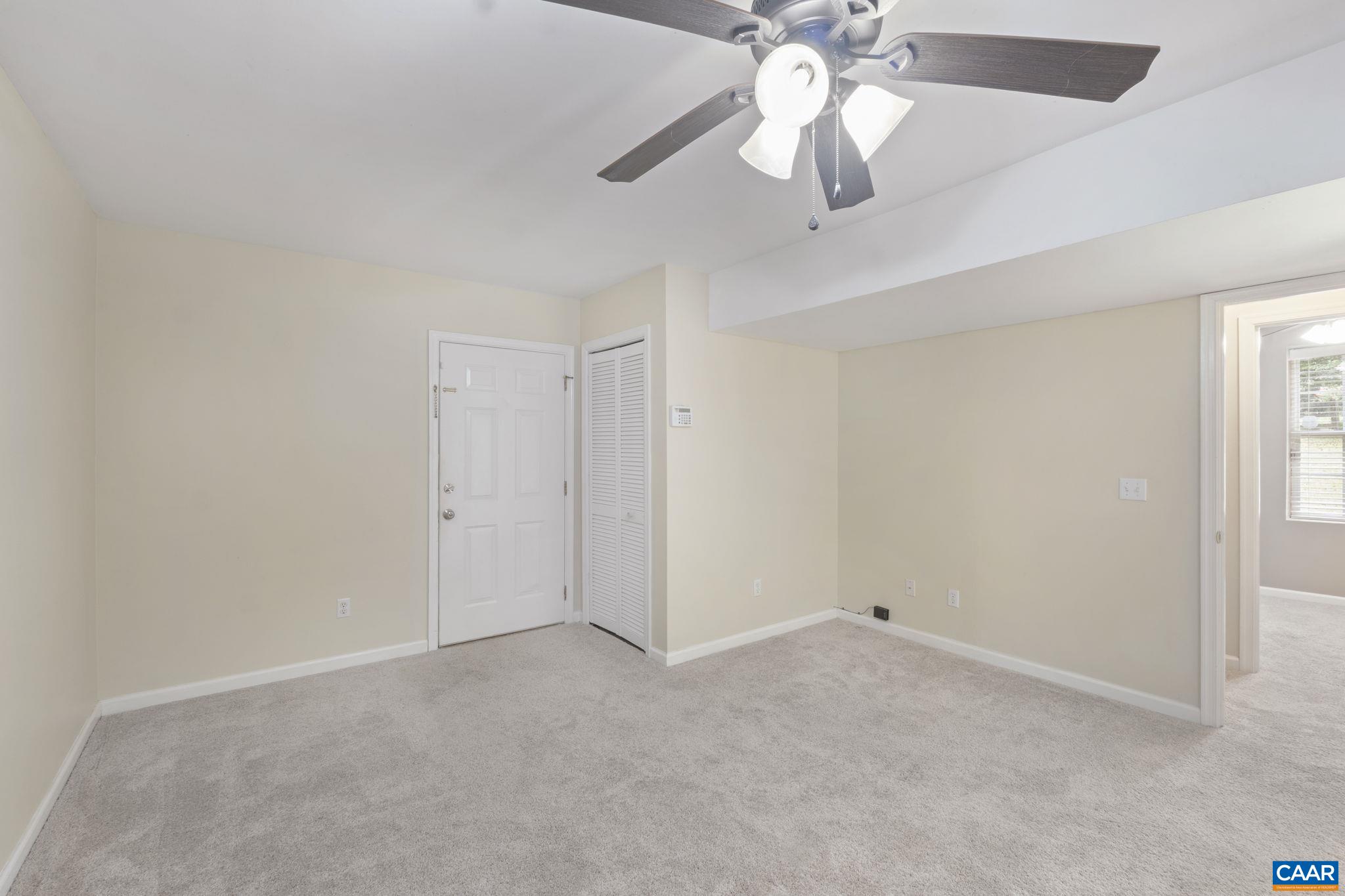 28 Lafayette Drive Palmyra, VA 22963 - Photo 25 of 35 a view of an empty room and chandelier fan