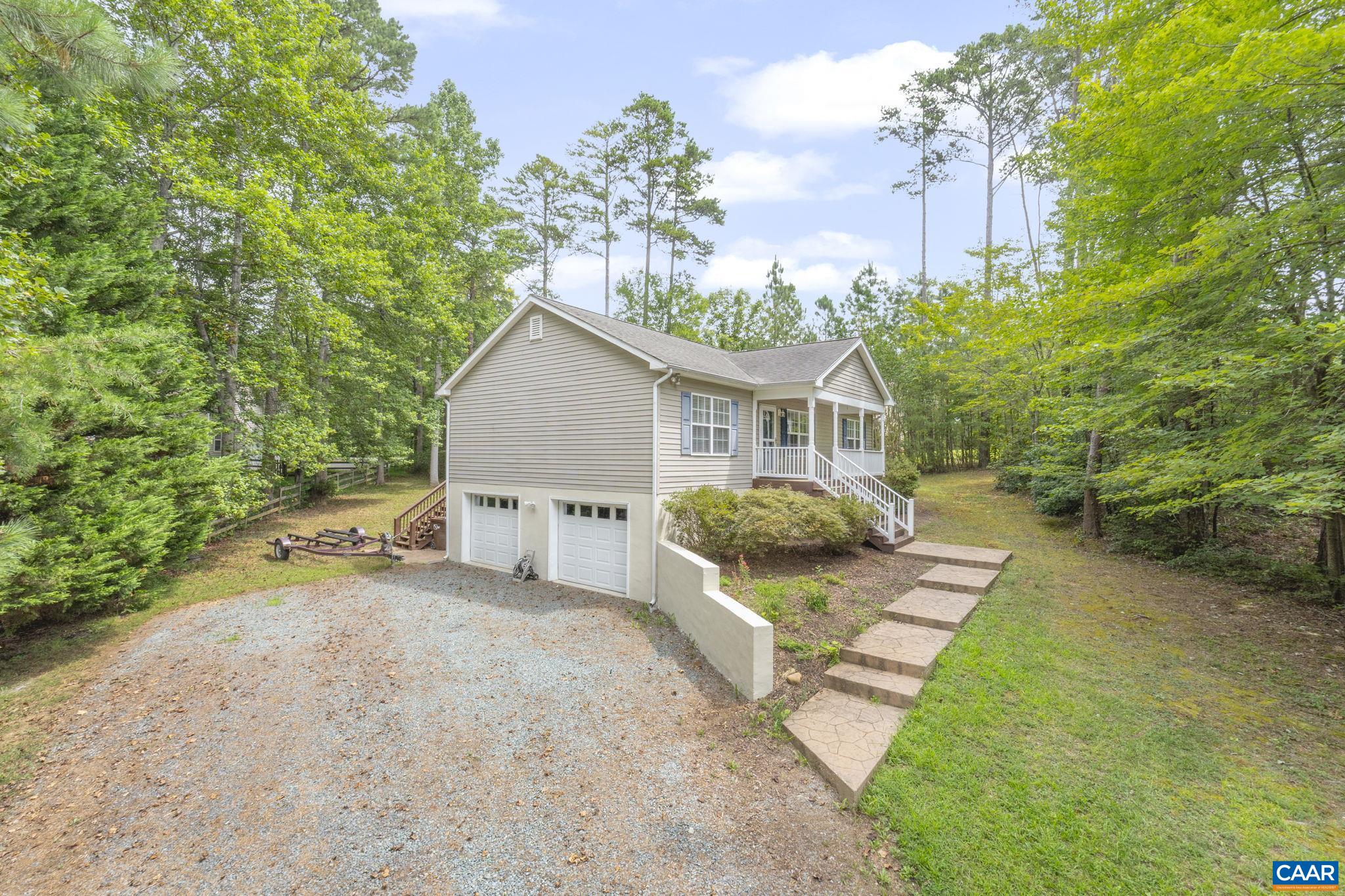 28 Lafayette Drive Palmyra, VA 22963 - Photo 30 of 35 a view of a house with backyard and garden