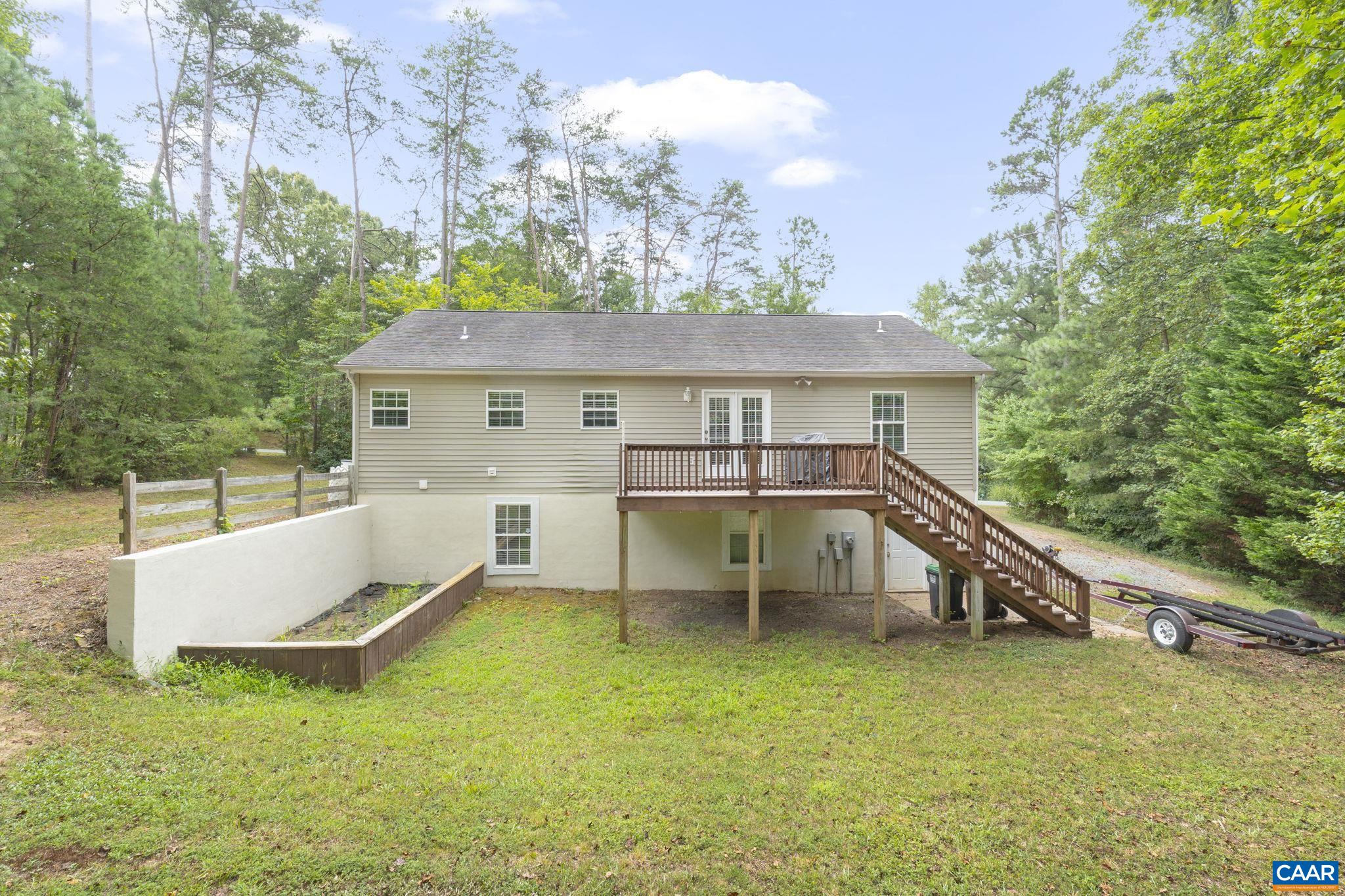 28 Lafayette Drive Palmyra, VA 22963 - Photo 33 of 35 a view of house with roof deck and seating space