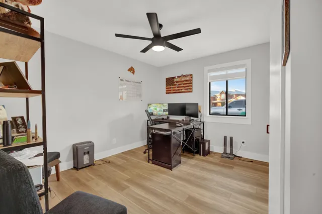 a workspace with furniture and window