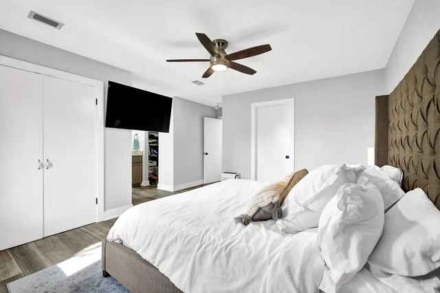 a bathroom with a double vanity sink and mirror