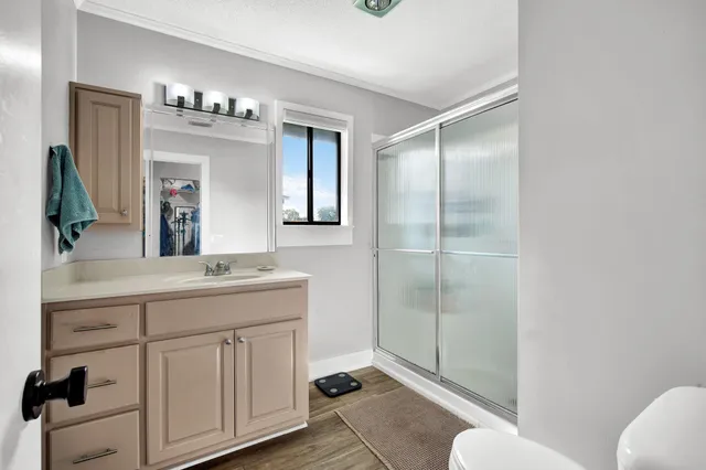 an outdoor space with swimming pool and furniture