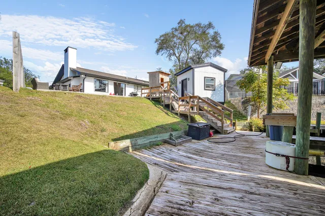 a view of a chairs and table in the patio