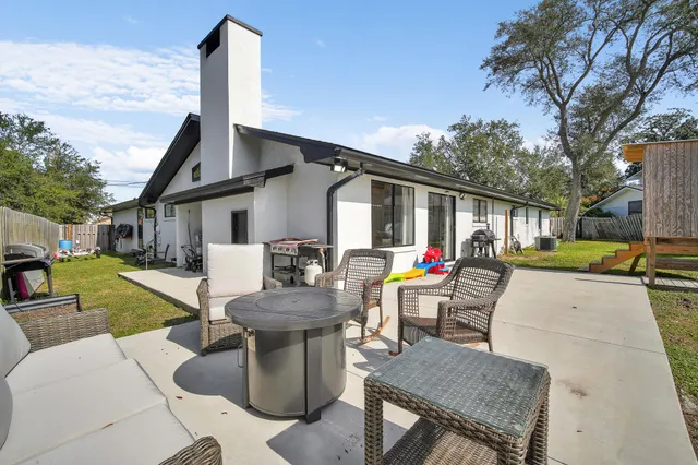 an aerial view of a house with swimming pool