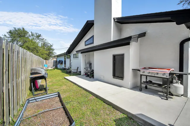 an aerial view of residential house with outdoor space